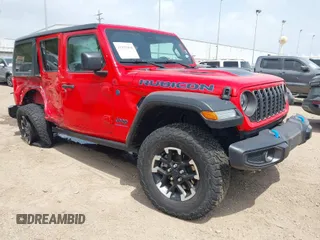 2024 Jeep Wrangler Rubicon with VIN 1C4RJXR62RW242108, listed as a IAAI auction lot 41955494 with 32,005 mi miles and . Bid and sale history available at DreamBid. Image 1.