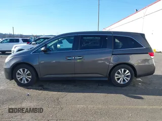 2016 Honda Odyssey SE with VIN 5FNRL5H32GB089740, listed as a IAAI auction lot 41402635 with 120,666 mi miles and . Bid and sale history available at DreamBid. Image 14.