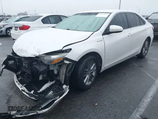 2017 Toyota Camry Hybrid LE with VIN 4T1BD1FKXHU213839, listed as a IAAI auction lot 41527665 with 113,345 mi miles. Bid and sale history available at carsss.com. Image 2.