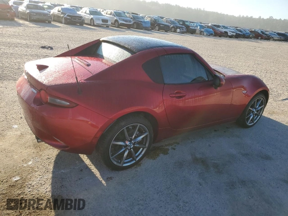 2023 Mazda MX-5 Miata Grand Touring with VIN JM1NDAM71P0559428, listed as a Copart auction lot 76596984 with 7,237 mi miles and Salvage title. Bid and sale history available at DreamBid. Image 3.