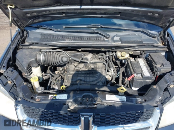 2013 Dodge Grand Caravan SXT with VIN 2C4RDGCG2DR652708, listed as a IAAI auction lot 42043026 with 245,442 mi miles and . Bid and sale history available at DreamBid. Image 10.