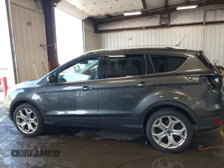 2019 Ford Escape Titanium with VIN 1FMCU9J97KUC55772, listed as a IAAI auction lot 42514001 with 77,737 mi miles and . Bid and sale history available at DreamBid. Image 15.
