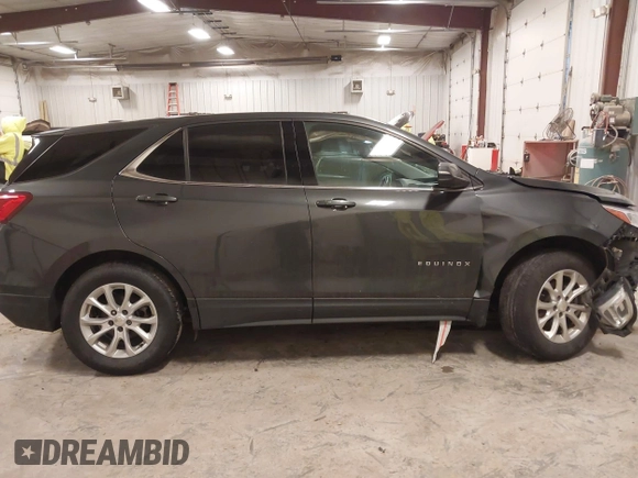 2019 Chevrolet Equinox LT with VIN 2GNAXKEV1K6157781, listed as a IAAI auction lot 41274846 with 128,425 mi miles and . Bid and sale history available at DreamBid. Image 13.