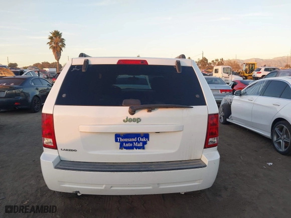 2006 Jeep Grand Cherokee Laredo with VIN 1J8GS48K16C348315, listed as a IAAI auction lot 41062772 with 239,662 mi miles. Bid and sale history available at carsss.com. Image 15.