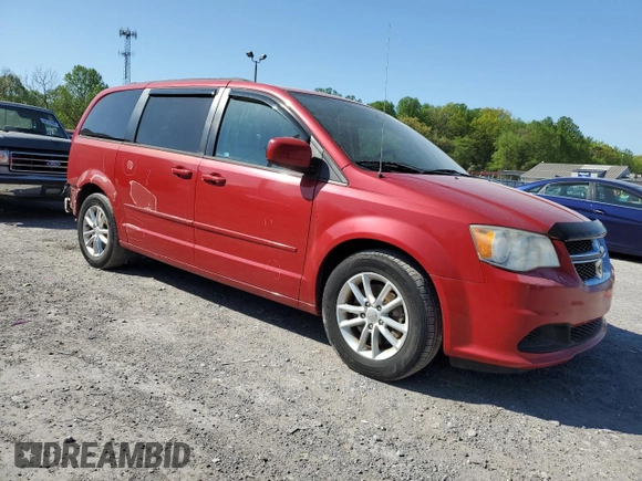 2014 Dodge Grand Caravan SXT with VIN 2C4RDGCG5ER182160, listed as a Copart auction lot 54140505 with 61,576 mi miles and Salvage Title. Bid and sale history available at DreamBid. Image 4.