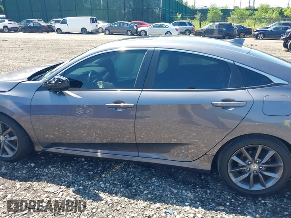 2020 Honda Civic EX-L with VIN 19XFC1F71LE201736, listed as a IAAI auction lot 39805242 with 47,132 mi miles and . Bid and sale history available at DreamBid. Image 14.