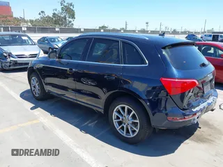2011 Audi Q5 Premium z VIN WA1CFAFP5BA032844, wystawiony jako IAAI lot #42226412 z przebiegiem 148 649 mil mil oraz . Historia ofert i sprzedaży dostępna na DreamBid. Obrazek 3.