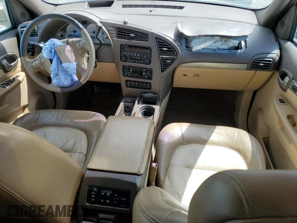 2002 Buick Rendezvous CXL with VIN 3G5DB03E02S596037, listed as a Copart auction lot 52425725 with 128,810 mi miles and Salvage Title. Bid and sale history available at DreamBid. Image 8.