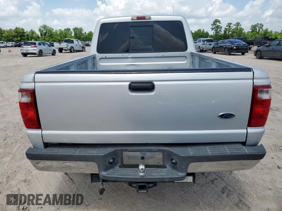 2001 Ford Ranger XL with VIN 1FTYR14V01PB46542, listed as a Copart auction lot 60977205 with 230,933 mi miles and Salvage title. Bid and sale history available at DreamBid. Image 6.