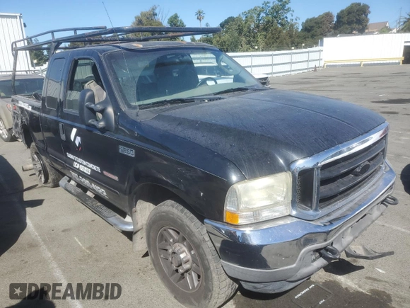 2003 Ford F-350 XL with VIN 1FTSX31P13EC62926, listed as a Copart auction lot 61341714 with 253,071 mi miles and Salvage Title. Bid and sale history available at DreamBid. Image 4.
