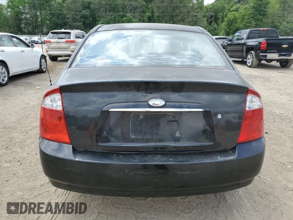 2006 Kia Spectra EX with VIN KNAFE121865361279, listed as a Copart auction lot 53486935 with 219,919 mi miles and Salvage Title. Bid and sale history available at carsss.com. Image 6.