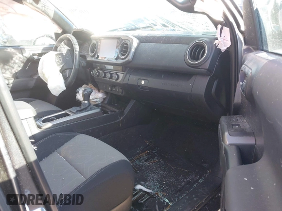 2023 Toyota Tacoma SR with VIN 3TMCZ5AN9PM574534, listed as a IAAI auction lot 41167910 with 27,375 mi miles and . Bid and sale history available at DreamBid. Image 5.