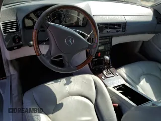 1999 Mercedes-Benz SL-Class with VIN WDBFA68F8XF186072, listed as a Copart auction lot 69557094 with 99,691 mi miles and Salvage Title. Bid and sale history available at carsss.com. Image 8.