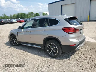 2021 BMW X1 xDrive28i with VIN WBXJG9C09M5S52289, listed as a Copart auction lot 64413105 with Not provided miles and Salvage title. Bid and sale history available at DreamBid. Image 2.