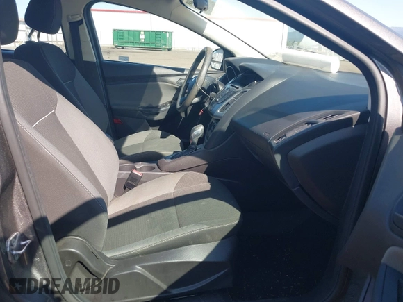 2012 Ford Focus SE with VIN 1FAHP3F26CL314852, listed as a IAAI auction lot 42162488 with 101,782 mi miles. Bid and sale history available at carsss.com. Image 5.