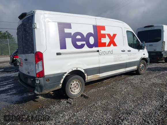 2020 Ford Transit Cargo z VIN 1FTBR1C87LKA51039, wystawiony jako IAAI lot #42212523 z przebiegiem 183 020 mil mil oraz . Historia ofert i sprzedaży dostępna na DreamBid. Obrazek 4.