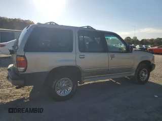 1999 Ford Explorer XL with VIN 1FMZU34X2XUA28059, listed as a Copart auction lot 77668294 with 131,064 mi miles and Salvage title. Bid and sale history available at DreamBid. Image 3.