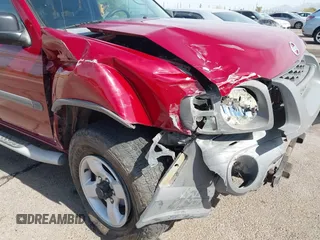 2004 Nissan Xterra XE z VIN 5N1ED28Y64C648877, wystawiony jako IAAI lot #42223244 z przebiegiem 139 983 mil mil oraz . Historia ofert i sprzedaży dostępna na DreamBid. Obrazek 6.