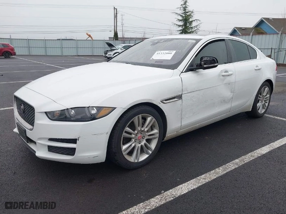 2019 Jaguar XE 25t with VIN SAJAR4FX0KCP52659, listed as a IAAI auction lot 41332080 with 96,936 mi miles. Bid and sale history available at carsss.com. Image 2.