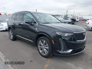 2023 Cadillac XT6 FWD Premium Luxury with VIN 1GYKPCRS5PZ119186, listed as a IAAI auction lot 41456602 with 32,189 mi miles. Bid and sale history available at carsss.com. Image 1.