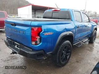 2023 Chevrolet Colorado 4WD Trail Boss with VIN 1GCPTEEK3P1208942, listed as a IAAI auction lot 41475026 with 11,576 mi miles. Bid and sale history available at carsss.com. Image 4.