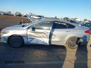 2017 Ford Fusion Hybrid Titanium with VIN 3FA6P0RU8HR190482, listed as a IAAI auction lot 41322244 with 137,539 mi miles and . Bid and sale history available at DreamBid. Image 14.