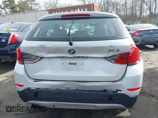 2015 BMW X1 xDrive28i with VIN WBAVL1C59FVY40443, listed as a IAAI auction lot 41777176 with 91,560 mi miles. Bid and sale history available at carsss.com. Image 15.