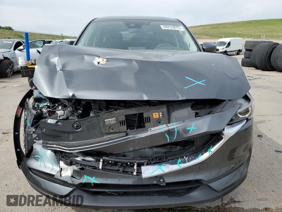 2018 Mazda CX-5 Touring z VIN JM3KFBCM2J0379190, wystawiony jako Copart lot #59233075 z przebiegiem 51 985 mil mil oraz Szkoda całkowita • Salvage title. Historia ofert i sprzedaży dostępna na DreamBid. Obrazek 5.
