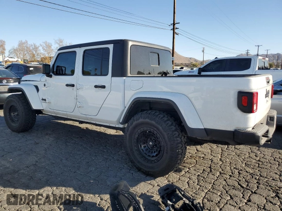2022 Jeep Gladiator Willys with VIN 1C6HJTAG9NL143314, listed as a Copart auction lot 87974155 with 25,106 mi miles and Salvage title. Bid and sale history available at DreamBid. Image 2.