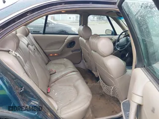 1998 Pontiac Bonneville SE with VIN 1G2HX52K0W4211117, listed as a IAAI auction lot 42125471 with 187,249 mi miles. Bid and sale history available at carsss.com. Image 8.