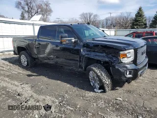 2015 GMC Sierra 2500HD available WiFi Denali with VIN 1GT120E86FF581670, listed as a Copart auction lot 49244415 with 211,894 mi miles and Salvage Title. Bid and sale history available at carsss.com. Image 4.