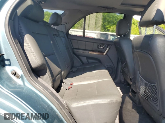 2003 Kia Sorento LX with VIN KNDJC733235055552, listed as a Copart auction lot 56196055 with 109,995 mi miles and Salvage title. Bid and sale history available at DreamBid. Image 10.