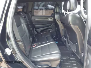 2018 Jeep Grand Cherokee High Altitude with VIN 1C4RJFCT5JC283704, listed as a IAAI auction lot 41613275 with 134,134 mi miles. Bid and sale history available at carsss.com. Image 8.
