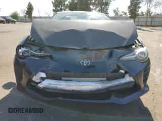2017 Toyota 86 with VIN JF1ZNAA15H9711096, listed as a Copart auction lot 70324104 with 79,095 mi miles and Salvage Title. Bid and sale history available at carsss.com. Image 5.