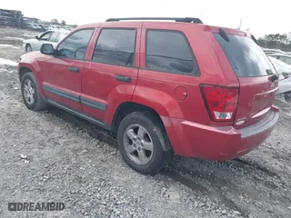 2006 Jeep Grand Cherokee Laredo with VIN 1J4GS48K06C301052, listed as a IAAI auction lot 41602467 with 205,881 mi miles. Bid and sale history available at carsss.com. Image 3.