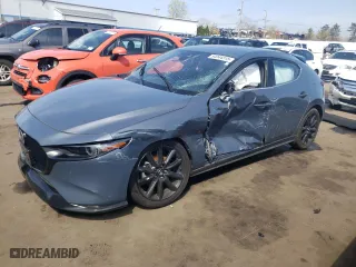 2021 Mazda Mazda3 Hatchback 2.5 Turbo Premium Plus with VIN JM1BPBNY7M1311309, listed as a Copart auction lot 54044315 with 59,642 mi miles and Salvage Title. Bid and sale history available at carsss.com. Image 1.