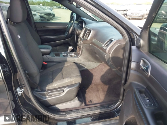 2018 Jeep Grand Cherokee Altitude with VIN 1C4RJFAG9JC436848, listed as a IAAI auction lot 42303459 with 124,044 mi miles and . Bid and sale history available at DreamBid. Image 5.