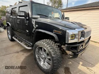 2004 Hummer H2 with VIN 5GRGN23U14H115951, listed as a Copart auction lot 79581694 with 88,845 mi miles and Salvage Title. Bid and sale history available at carsss.com. Image 1.