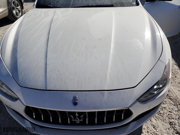 2018 Maserati Ghibli with VIN ZAM57XSA4J1295191, listed as a Copart auction lot 82411644 with NaN miles and Salvage Title. Bid and sale history available at carsss.com. Image 11.