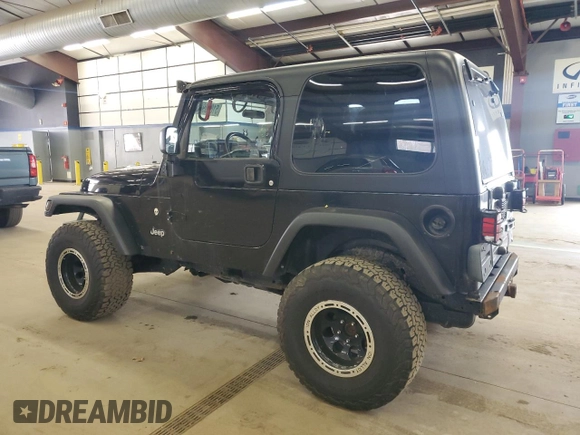 2004 Jeep Wrangler Sport with VIN 1J4FA49S64P722986, listed as a Copart auction lot 51840985 with 129,761 mi miles and Clean title. Bid and sale history available at DreamBid. Image 2.