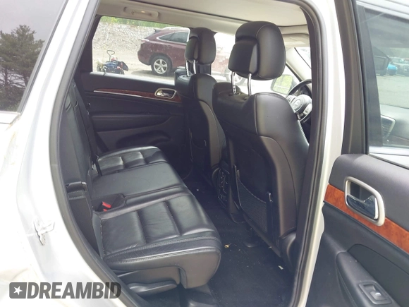 2011 Jeep Grand Cherokee Limited with VIN 1J4RR5GG6BC723134, listed as a IAAI auction lot 42310026 with 117,344 mi miles and . Bid and sale history available at DreamBid. Image 8.