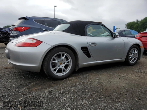 2006 Porsche Boxster with VIN WP0CA29886U710781, listed as a Copart auction lot 64518675 with 86,488 mi miles and Salvage title. Bid and sale history available at DreamBid. Image 3.