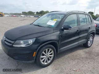 2017 Volkswagen Tiguan S with VIN WVGAV7AX1HK044305, listed as a IAAI auction lot 41847023 with 65,740 mi miles. Bid and sale history available at carsss.com. Image 2.