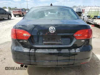 2014 Volkswagen Jetta SE with VIN 3VWD07AJ7EM293656, listed as a Copart auction lot 55077455 with 82,160 mi miles and Salvage title. Bid and sale history available at DreamBid. Image 6.