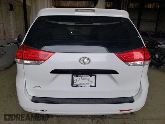 2014 Toyota Sienna L with VIN 5TDZK3DCXES441002, listed as a Copart auction lot 87139804 with 229,943 mi miles and Salvage Title. Bid and sale history available at carsss.com. Image 6.