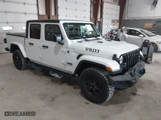2021 Jeep Gladiator Texas Trail with VIN 1C6HJTAG3ML548261, listed as a IAAI auction lot 41791595 with 34,582 mi miles. Bid and sale history available at carsss.com. Image 1.