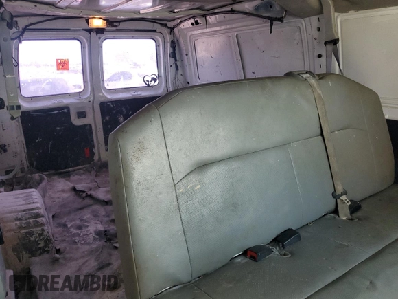 2010 Ford Econoline Cargo Commercial with VIN 1FTNE1EW1ADA07205, listed as a Copart auction lot 55904025 with 309,958 mi miles and Clean Title. Bid and sale history available at DreamBid. Image 11.