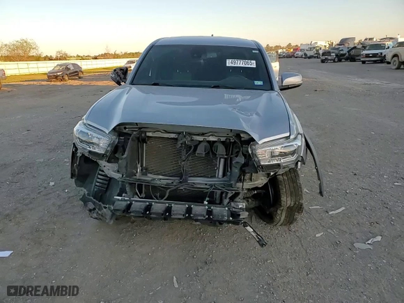 2021 Toyota Tacoma 4WD SR with VIN 3TMCZ5AN9MM415928, listed as a Copart auction lot 49777065 with 96,617 mi miles and Salvage Title. Bid and sale history available at carsss.com. Image 10.