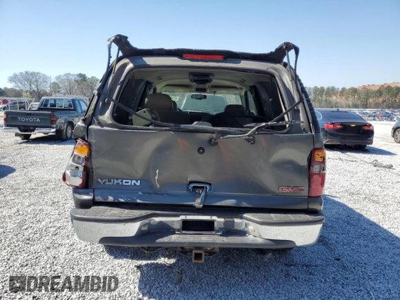 2002 GMC Yukon SLE z VIN 1GKEC13V92R139024, wystawiony jako Copart lot #42669825 z przebiegiem 429 527 mil mil oraz Szkoda całkowita • Salvage title. Historia ofert i sprzedaży dostępna na DreamBid. Obrazek 6.