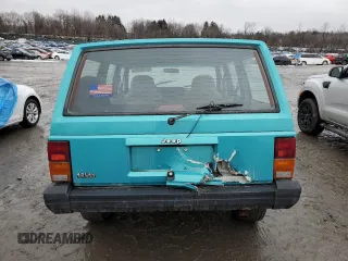 1996 Jeep Cherokee SE z VIN 1J4FJ28S9TL234675, wystawiony jako Copart lot #44796545 z przebiegiem 113 663 mil mil oraz Szkody całkowita. Historia ofert i sprzedaży dostępna na DreamBid. Obrazek 6.